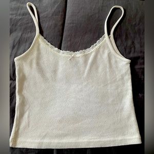 Brandy Melville Skylar Lace Eyelet Tank (Never worn). Regular fit.